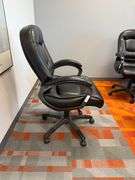 BLACK LEATHER ARM CHAIR W/ CASTERS