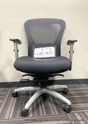 9-5 BLACK ARM CHAIR ON CASTERS