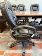 BLACK LEATHER ARM CHAIR W/ CASTERS