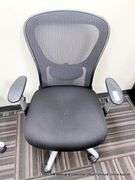 9-5 BLACK ARM CHAIR ON CASTERS