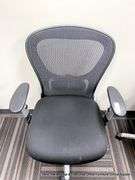 9-5 BLACK ARM CHAIR ON CASTERS