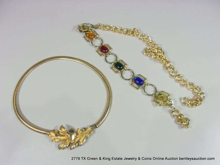 BAG: 2 FASHION GOLD TONE BELTS, 1 W/ LEAF PATTERN, 1 W/ COLORED GLASS STONES