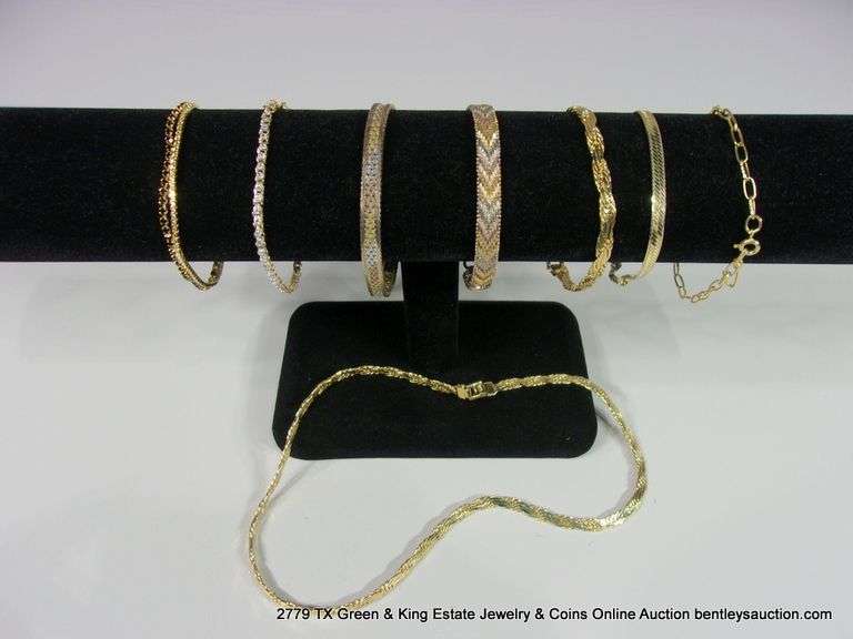 LOT: 8 GOLD TONED/GOLD PLATED BRACELETS AND NECKLACES