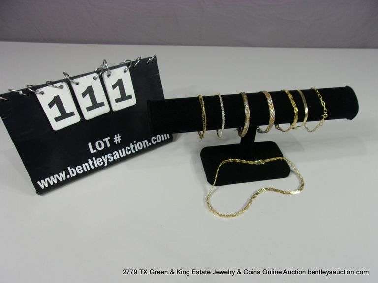 LOT: 8 GOLD TONED/GOLD PLATED BRACELETS AND NECKLACES