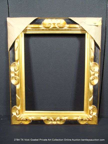 BLACK & GOLD PAINTED, CARVED WOODEN FRAME 21 X 25