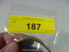 BAG OF ASSORTED JEWELRY: 12K GOLD FILLED BANGLE BRACELET (SAFTEY CHAIN BROKEN), 1-10K GOLD & DIAMOND