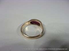 GOLD RING: PINK TONED RUBY, OVAL STONE, SIZE 10 1/4