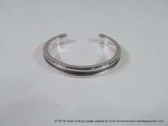 MATCHING SET: SILVER TONED BRACELET & EARRINGS W/ BLACK LEATHER GROOVE INLAY