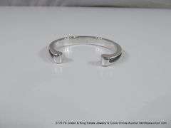 MATCHING SET: SILVER TONED BRACELET & EARRINGS W/ BLACK LEATHER GROOVE INLAY