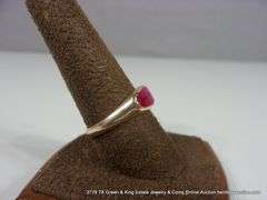 GOLD RING: PINK TONED RUBY, OVAL STONE, SIZE 10 1/4