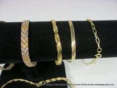 LOT: 8 GOLD TONED/GOLD PLATED BRACELETS AND NECKLACES