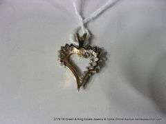 14K YELLOW GOLD HEART SHAPED PENDANT W/ SOLITAIRE & BAGUETTE DIAMONDS