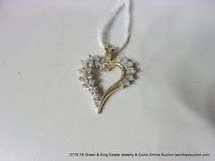 14K YELLOW GOLD HEART SHAPED PENDANT W/ SOLITAIRE & BAGUETTE DIAMONDS