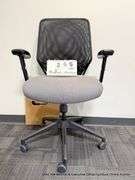 BLACK OFFICE CHAIR ON CASTERS