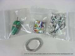 LOT: 4 ASSORTED FASHION PENDANTS