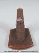 14K WHITE GOLD GARNET & DIAMOND FLORAL MOTIF ACCENT RING, SIZE 6.5