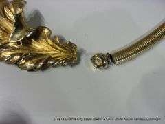 BAG: 2 FASHION GOLD TONE BELTS, 1 W/ LEAF PATTERN, 1 W/ COLORED GLASS STONES