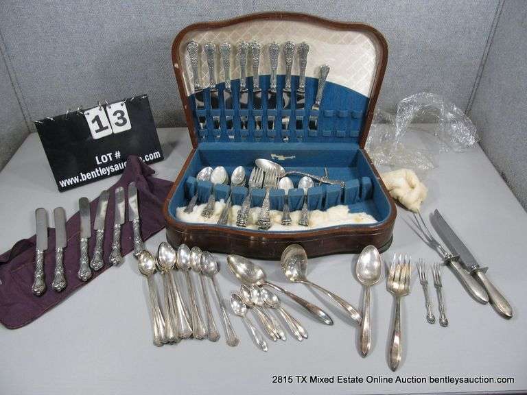 ASSORTED STYLES , 83 TOTAL PIECES, 56 PIECES MARKED STERLING, THE REST SILVER PLATE FLATWARE IN WOOD