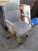 BLUE CUSHIONED VINTAGE WOODEN OFFICE ROLLING CHAIR