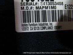 BROWN UPHOLSTERED CHAIR