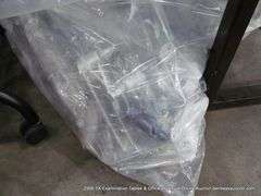 LOT: PLASTIC BAG W/ ASSORTED METAL FURNITURE PARTS
