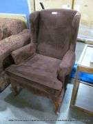 BROWN UPHOLSTERED CHAIR