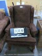 BROWN UPHOLSTERED CHAIR