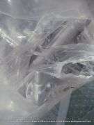 LOT: PLASTIC BAG W/ ASSORTED METAL FURNITURE PARTS