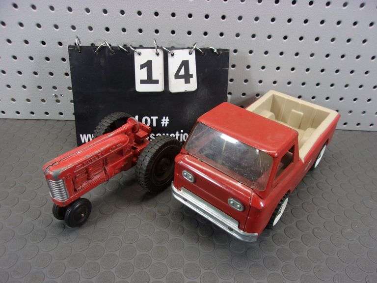 LOT: (1) HUBLEY JR. TOY TRACTOR, (1) STRUCK TOY TRUCK
