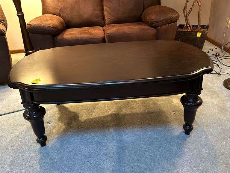 52x32x19 espresso colored coffee table with bevel edge .  Matches lot 4