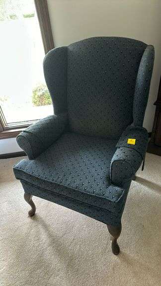 Navy fireside chair with Queen Anne legs