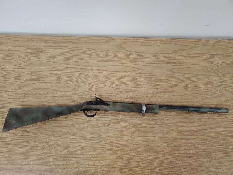 Traditions Inc., Fox River 50 caliber black powder rifle. Does not appear to be in working condition.