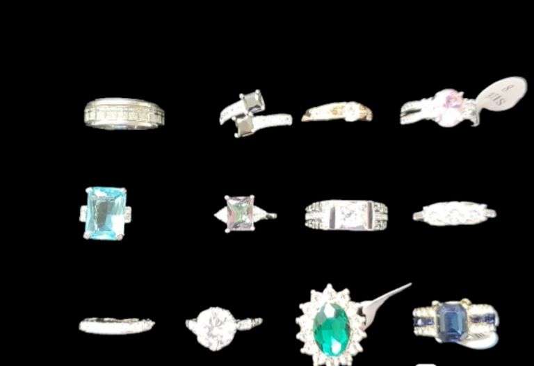 Twelve size 8 rings silvertone and copper tone assorted colored stones ...
