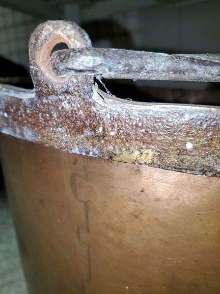 Large antique copper pot / cauldron with wrought iron handle measures 23-in round X 16 in tall