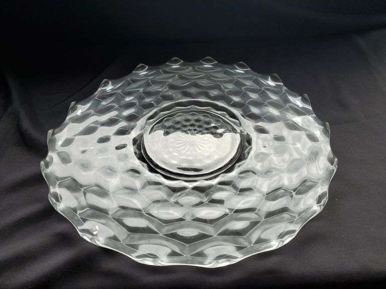 18-1/2" glass platter with raised ripple edges.