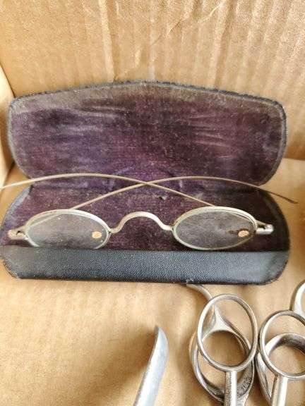 Early spectacles, barber supplies, straight razors