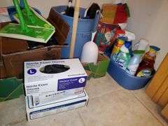 Hall closet contents includes Swiffer wet mop cloths and dry mop cloths, Swiffer mops, magic erasers, latex gloves, garbage bags, O-Cedar broom and dustpan, Swiffer mops, bona wood floor mop, scrub brushes, nitrile gloves, assorted cleaners, gift bag tissue paper, cleaning buckets, cloth bags. See photos