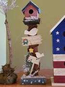 (4) decorative wooden birdhouses, bird in tree.