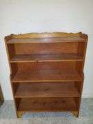 Pinewood bookcase measures 36 in W X 10 in D X 48 in H. Basement