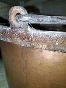 Large antique copper pot / cauldron with wrought iron handle measures 23-in round X 16 in tall