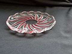 (2) pieces red swirl glass candy dish and small 9" plate