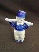 Delft blue bisque water boy figurine, pipe and collectors pieces 7 book