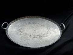 Silver plate, aluminum and other serving platters.