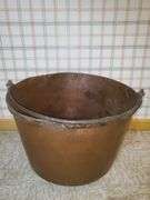 Large antique copper pot / cauldron with wrought iron handle measures 23-in round X 16 in tall