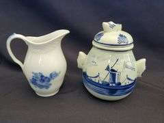 Delft Blue pitchers, covered pot, salt & pepper