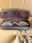 Early spectacles, barber supplies, straight razors