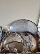 Silver plate, aluminum and other serving platters.