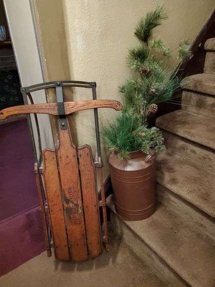 Milk can with pine and Flexible Flyer sled