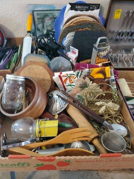 2 Home Kitchen boxes including Heat Resistant Pads, Graters, Strainers, Whisks, Measuring Cups, Can opener, Rolling Pins, Decor, and More