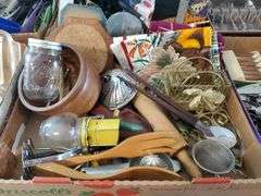 2 Home Kitchen boxes including Heat Resistant Pads, Graters, Strainers, Whisks, Measuring Cups, Can opener, Rolling Pins, Decor, and More
